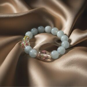 Garden Dreams: Baby Blue and Floral Lampwork Glass Stretch Bracelet